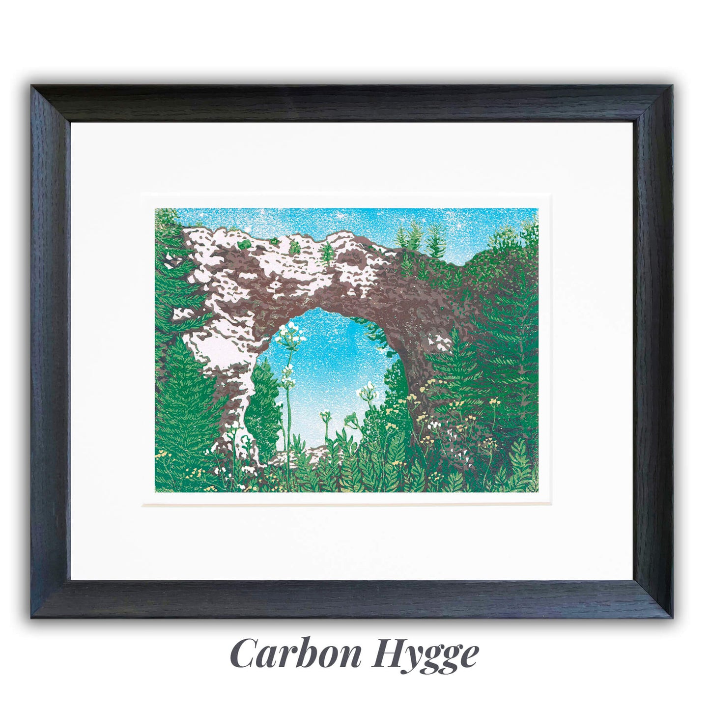 An eight-color 12" x 9" block print titled "Arch Rock" and inspired by the most iconic rock formation on Mackinac Island: Arch Rock. Framed with the Carbon Hygge frame option.