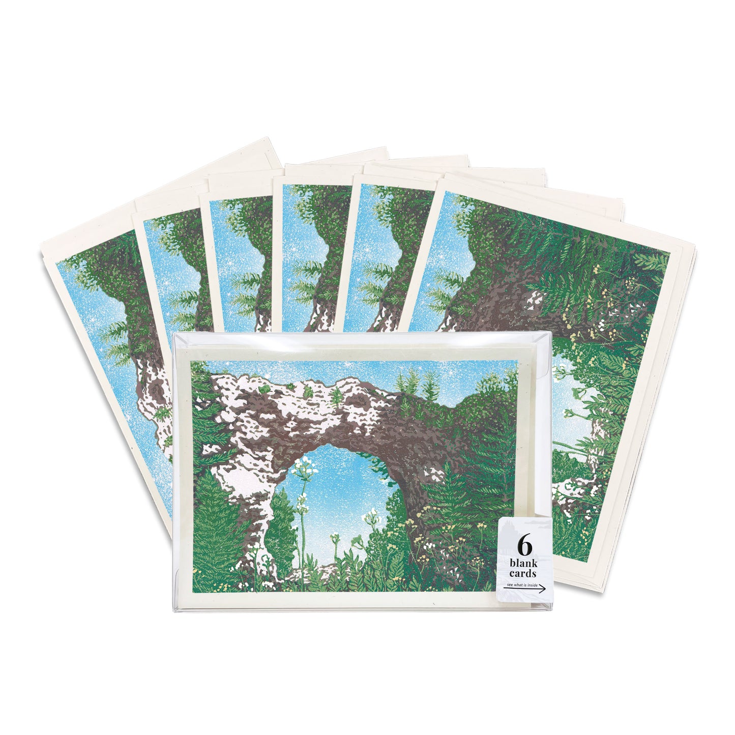 A boxed set of six blank A6 greeting cards featuring a block print of Mackinac Island's Arch Rock.