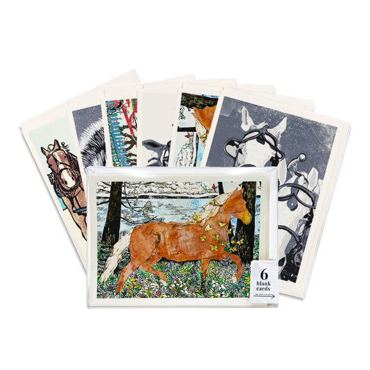 Set of six blank cards with horse-themed block prints on a white background.
