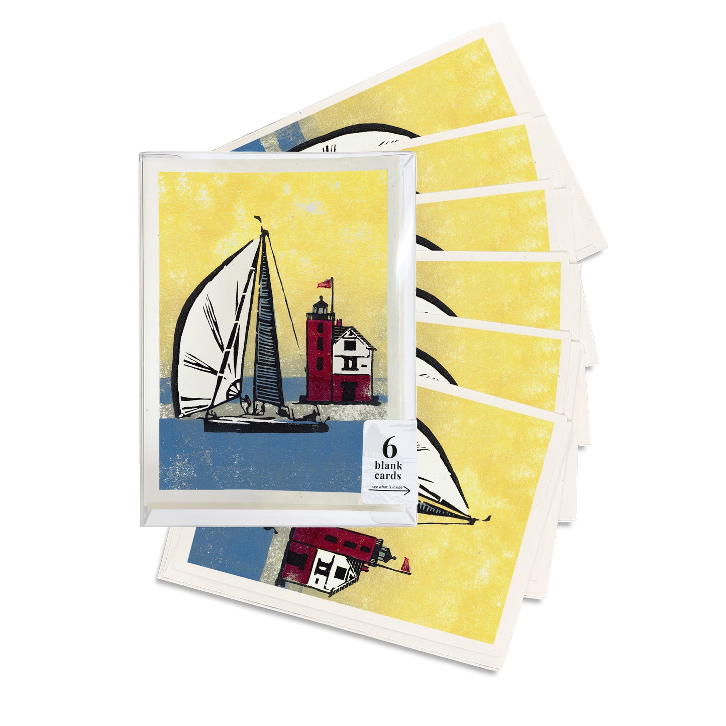 A boxed set of six casually elegant cards featuring sailing and lighthouse art by Natalia Wohletz titled Foggy Finish.