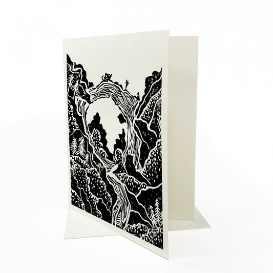 A casually elegant card featuring Mackinac Island art by Natalia Wohletz titled Below the Arch.