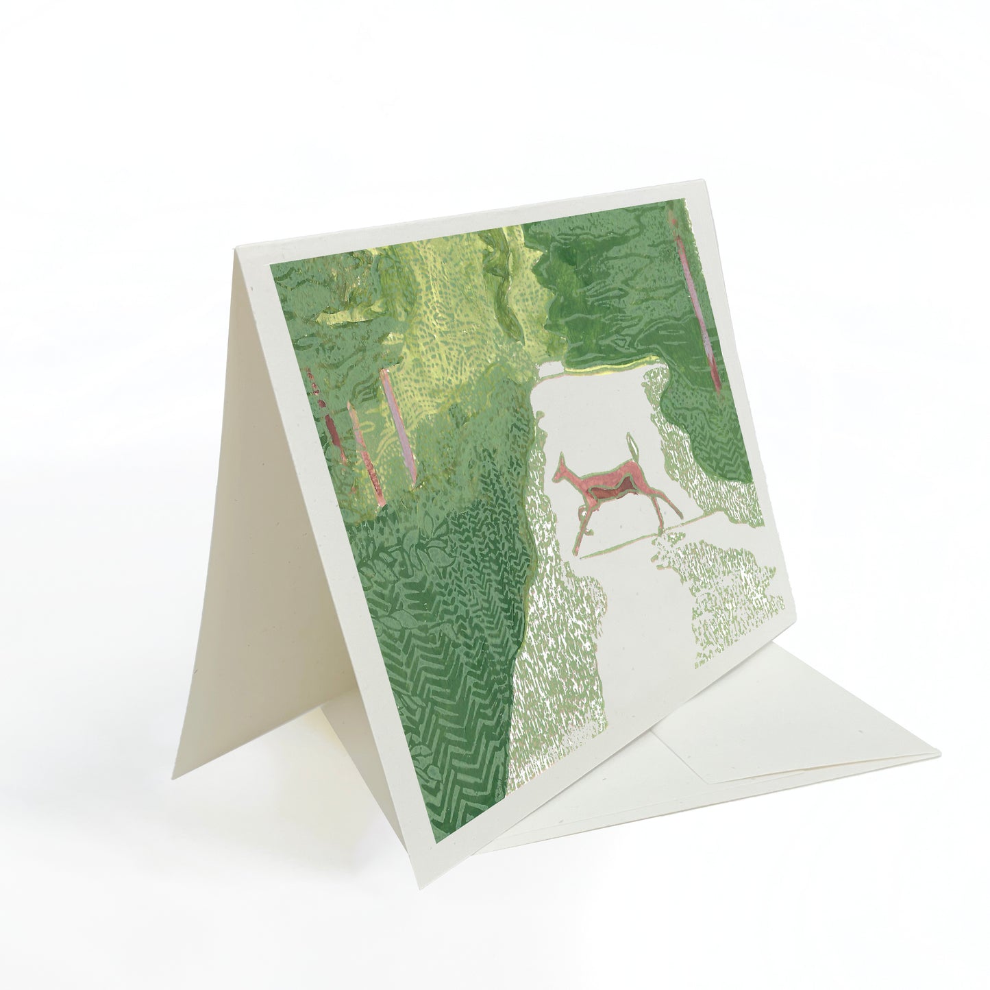 A casually elegant card featuring Michigan wildlife art by Natalia Wohletz titled Doe Crossing.