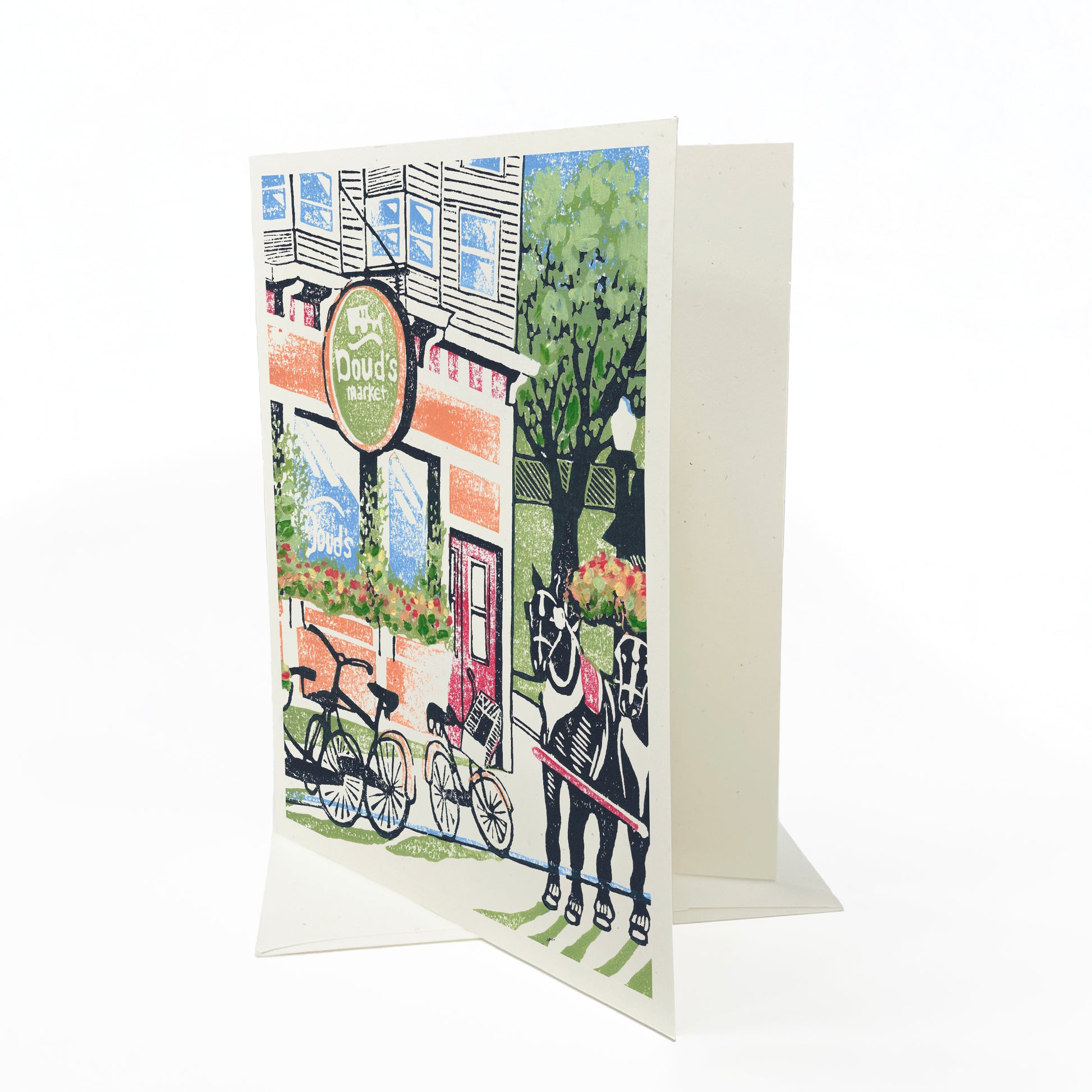 A casually elegant card featuring Mackinac Island art by Natalia Wohletz of Peninsula Prints titled Doud's Market #2.