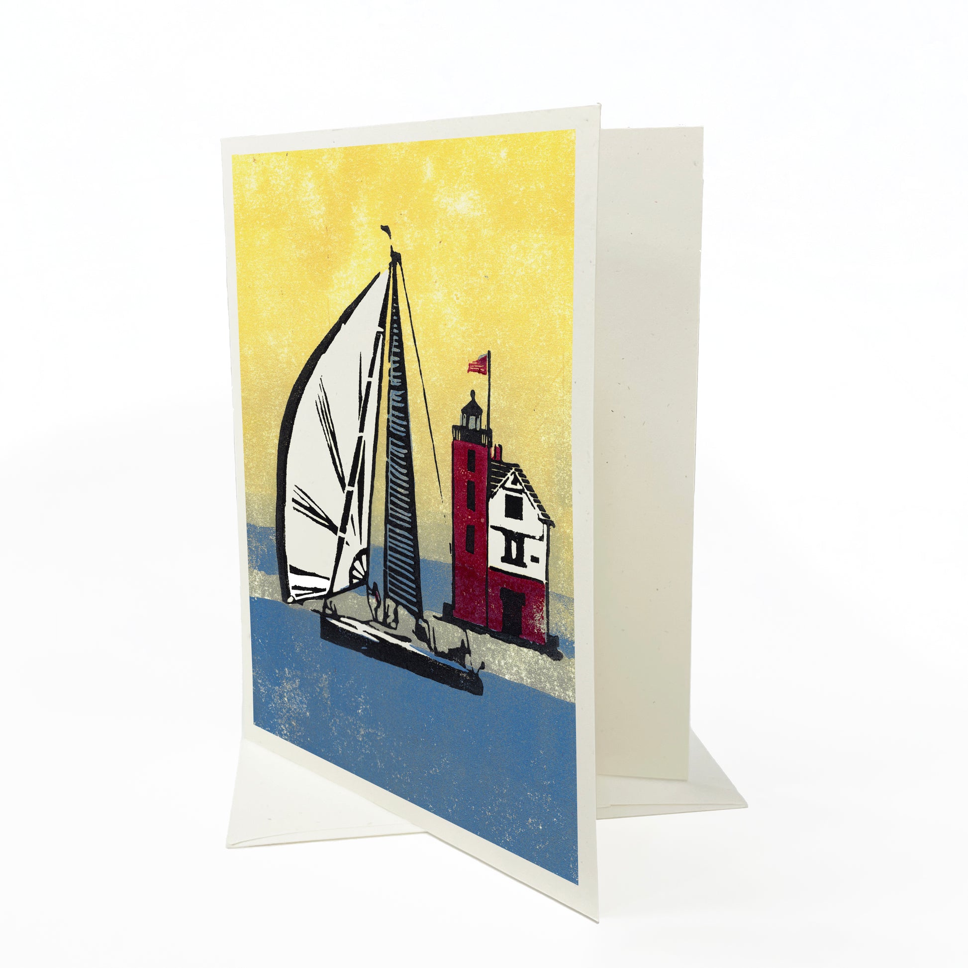 A casually elegant card featuring sailing and lighthouse art by Natalia Wohletz titled Foggy Finish.