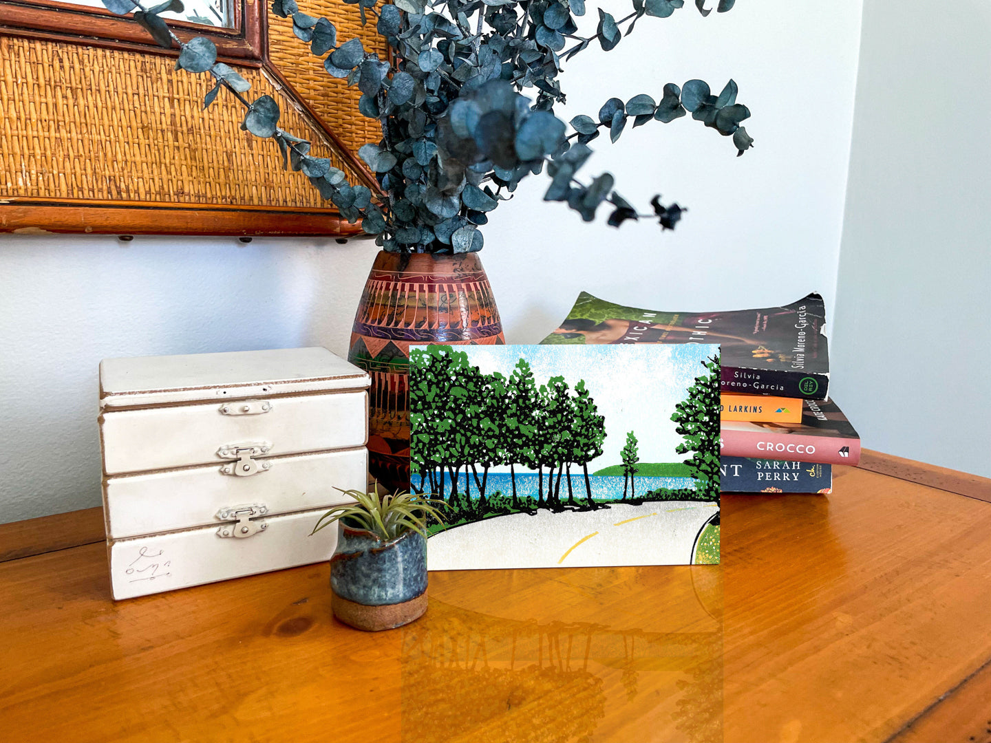 A high-quality, mounted giclée fine art print of a lino cut block print design by award-winning artist Natalia Wohletz, Peninsula Print, titled Bend by the Bay.