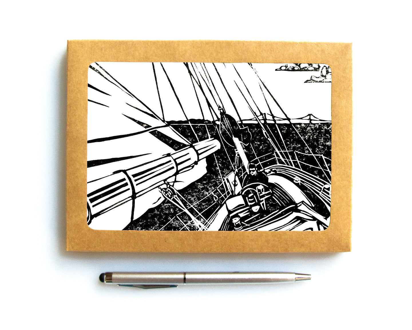 Blank card featuring a linoleum block print design by Natalia Wohletz of Peninsula Prints.  It's perfect for sending a personalized note or displayed in a frame.  It is available individually, as a boxed set of six or in customized sets of 25 or 50.  The design was inspired by the thrill of sailing on the Great Lakes and the fearless sailors who compete in the Chicago and Bayview Yacht Races to Mackinac Island.