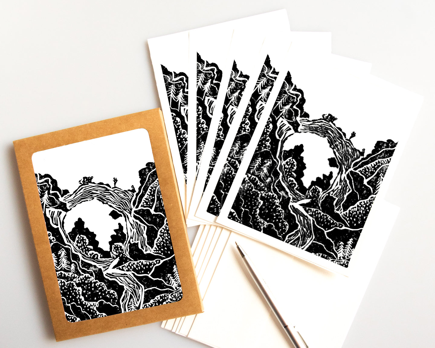 A casually elegant set of cards featuring Mackinac Island art by Natalia Wohletz titled Below the Arch.