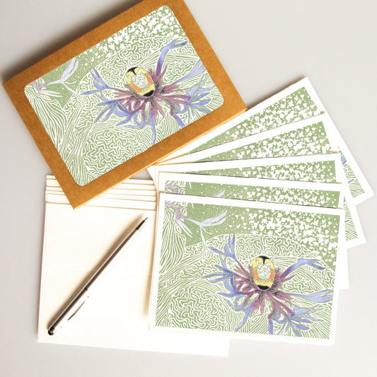 A casually elegant card featuring Mackinac Island art by Natalia Wohletz titled Bumblebee on Perennial Cornflower..