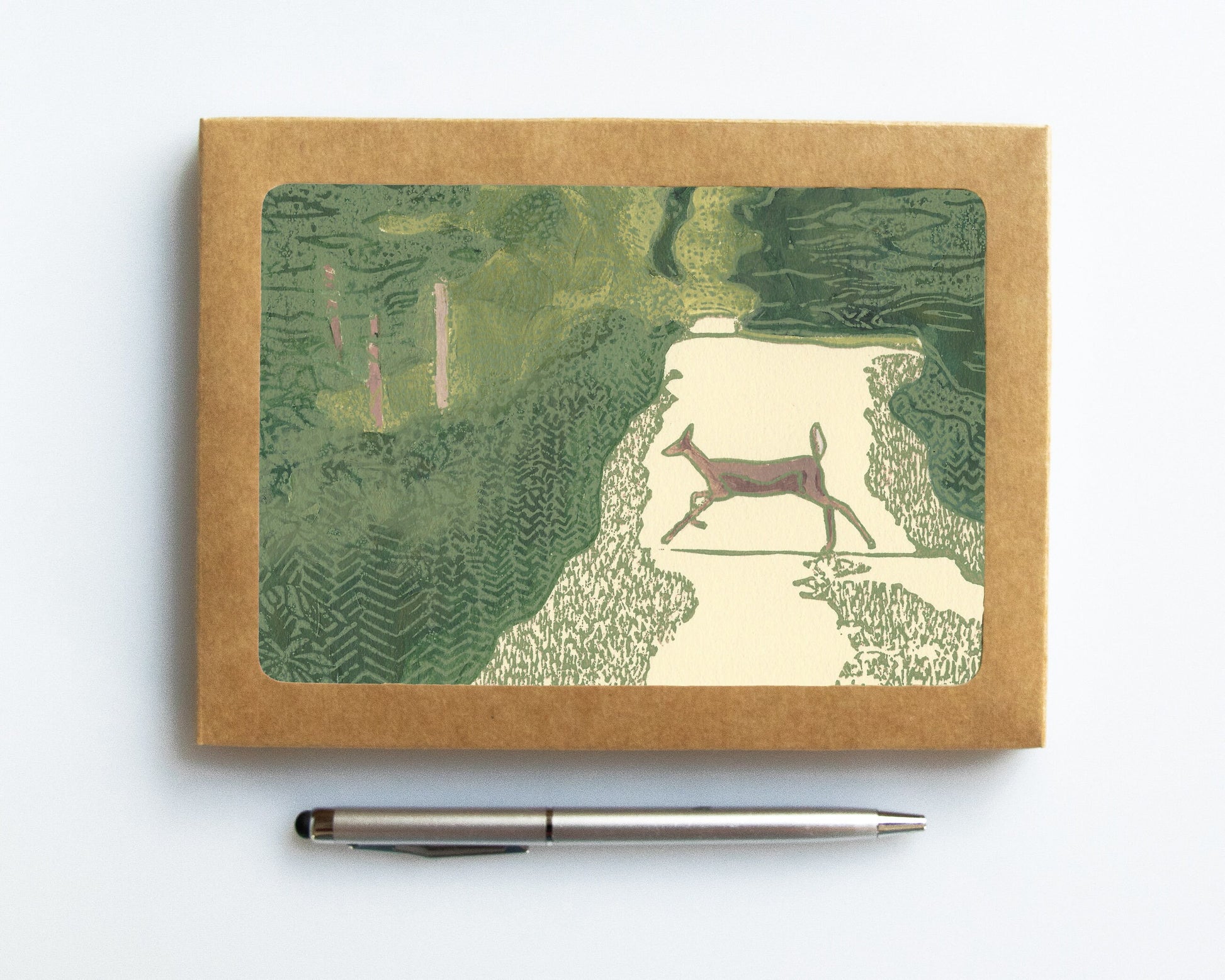 A casually elegant card set featuring Michigan wildlife art by Natalia Wohletz titled Doe Crossing.