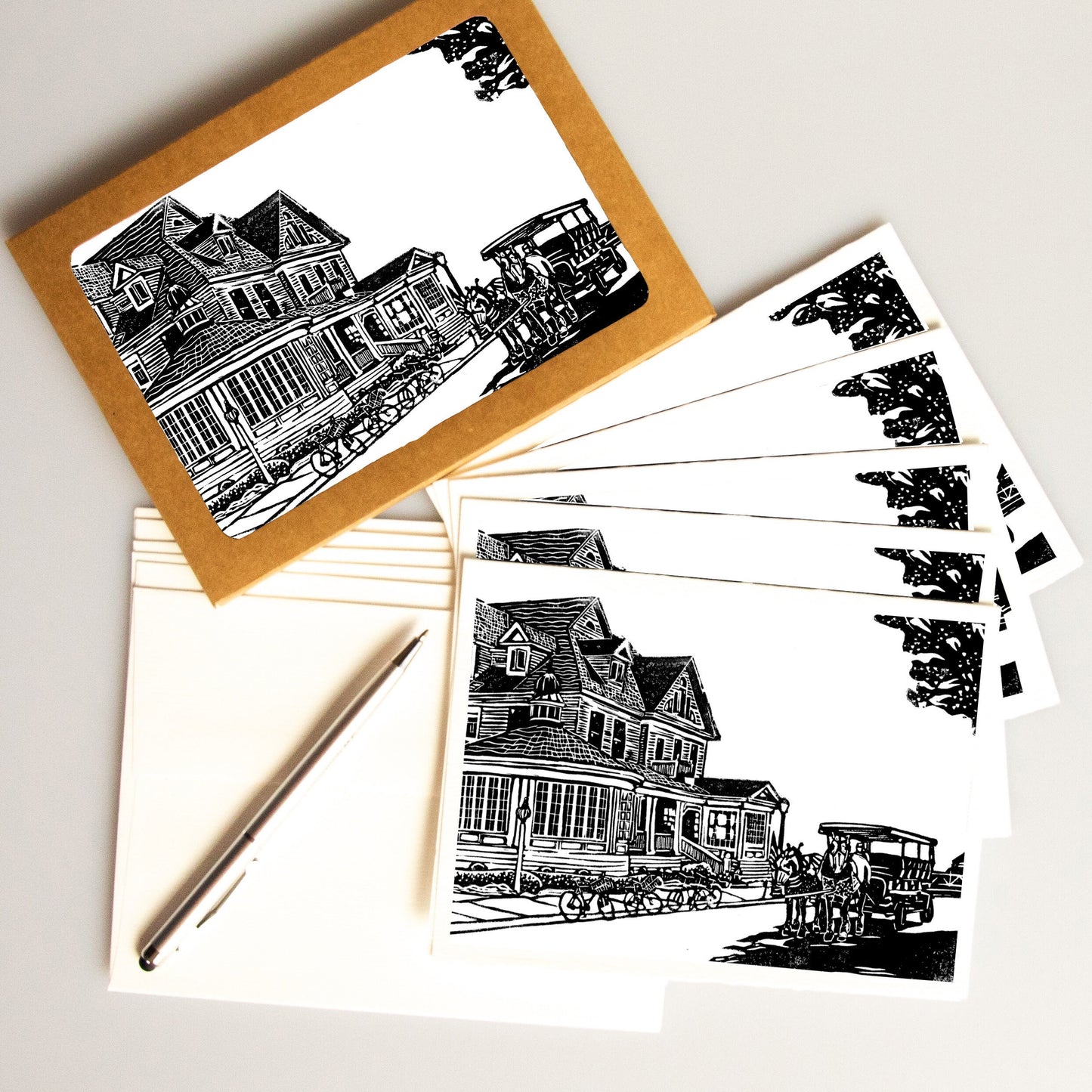 A casually elegant card set featuring Mackinac Island art by Natalia Wohletz titled Hotel Iroquois.