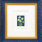 Daffodils is a 2"x3" four-color reduction block print inspired by the joyful spring blooms. Float mounted on soft white, then surrounded by a soft white double mat and framed in a stacked yellow, then blue frame with petal-shaped embossed detailing.