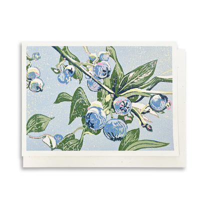 Eco-friendly A6 card with blueberries on a leafy branch against a light blue background.