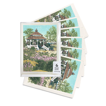 A boxed set of six casually elegant cards featuring Mackinac Island art by Natalia Wohletz of Peninsula Prints title Mission Point Gazebo.