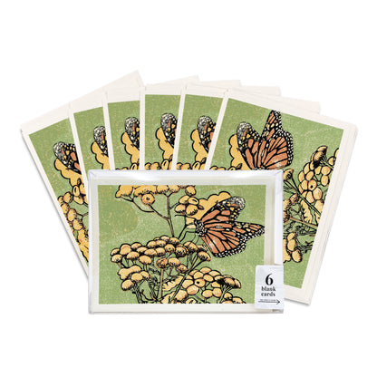 A boxed set of six casually elegant cards featuring monarch butterfly art by Natalia Wohletz titled Monarch on Tansy.