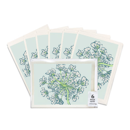 A boxed set of six casually elegant cards featuring Michigan wildflowers art by Natalia Wohletz titled Queen Anne's Lace.