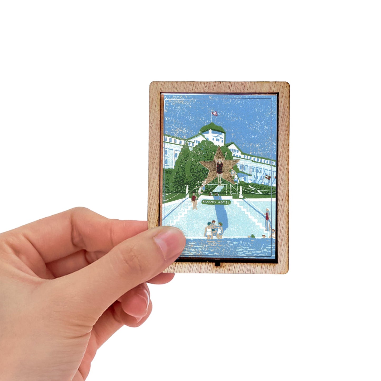 Decorative magnet featuring the block print, "Esther Williams, the Water Ballerina," by Peninsula Prints. The magnet has a protective clear coating and wooden frame.