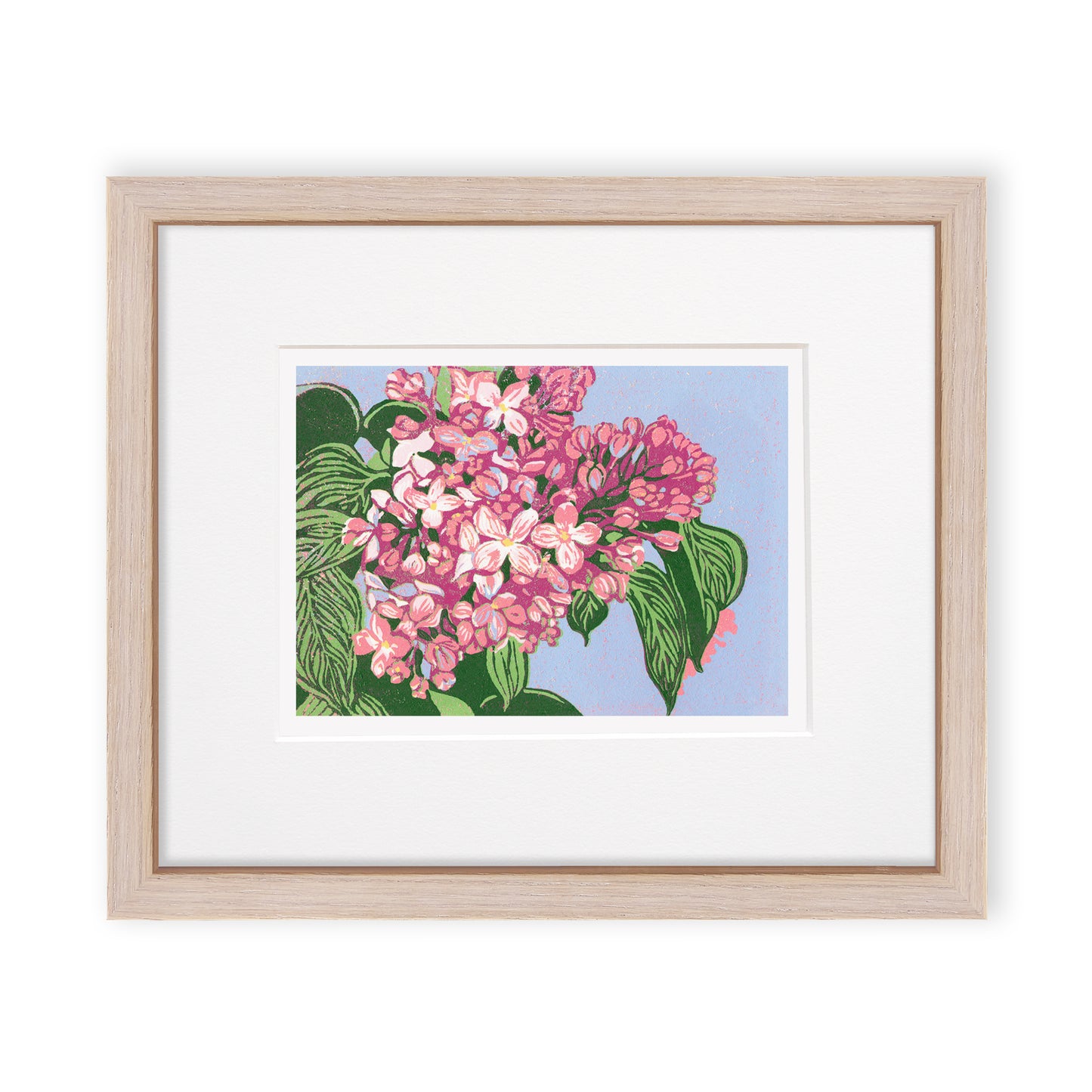 Reduction block print of blooming pink lilacs with olive green leaves against a periwinkle background. Matted in white and framed in a narrow cerused oak frame.