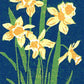 Daffodils is a 2"x3" four-color reduction block print inspired by the joyful spring blooms.