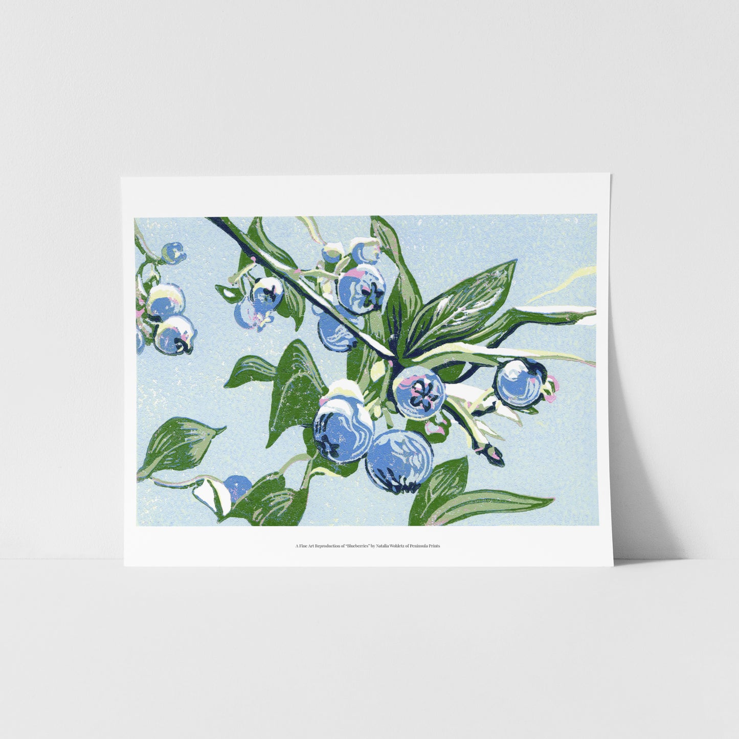 A fine art reproduction of "Blueberries," a miniature 4"x6" seven-color reduction block print of blueberries growing on a leafy blueberry bush branch. They look juicy and sweet, and ripe for the picking!