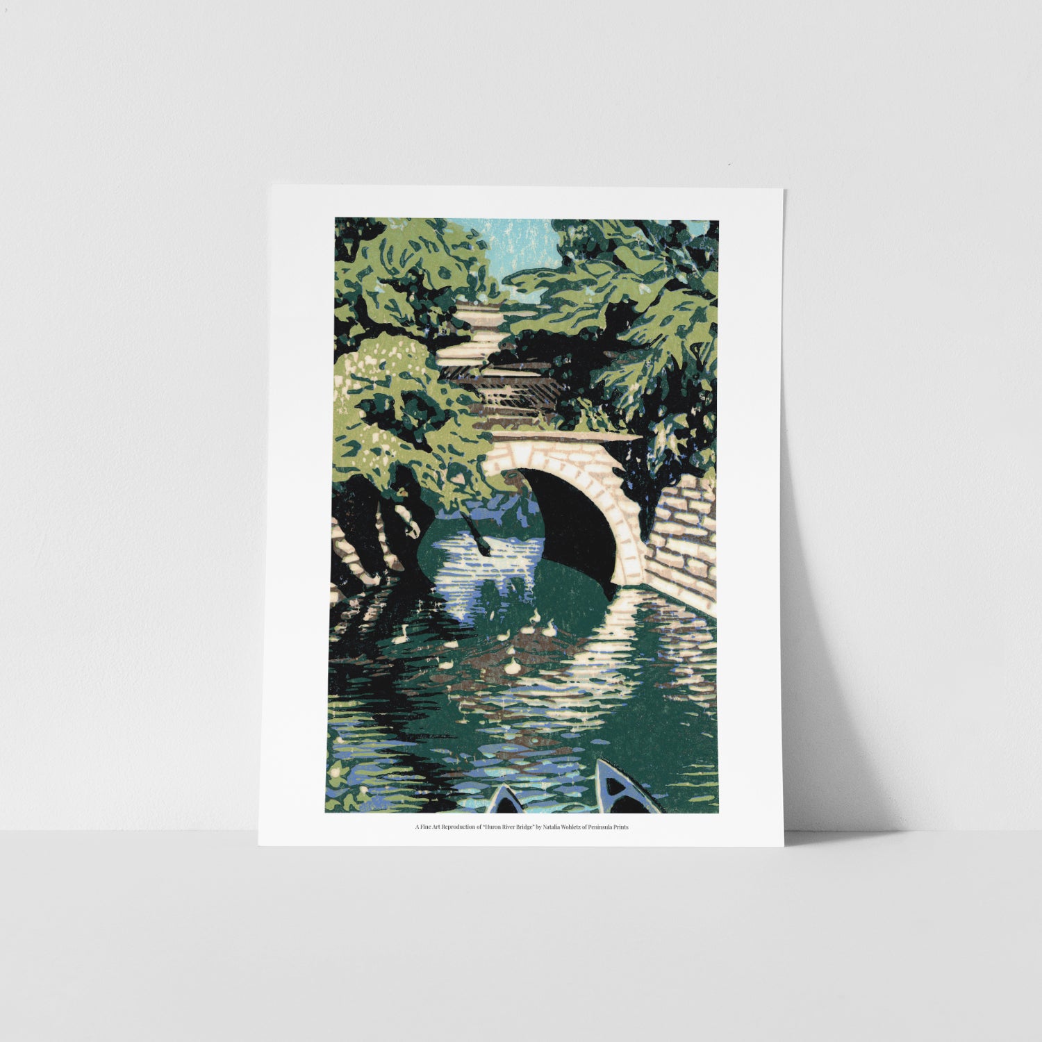 A fine art reproduction of "Huron River Bridge," a seven-color 4" x 6" block print of the historic railroad bridge on the east side of Main Street in Milford, Michigan that spans the Huron River.