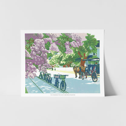 A fine art reproduction of "Lilac Avenue," a nine-color 10" x 8" block print with gold embellishments showcasing a dreamy street on Mackinac Island during the Lilac Festival with the wonderfully-smelling lilac bushes are in full bloom.  