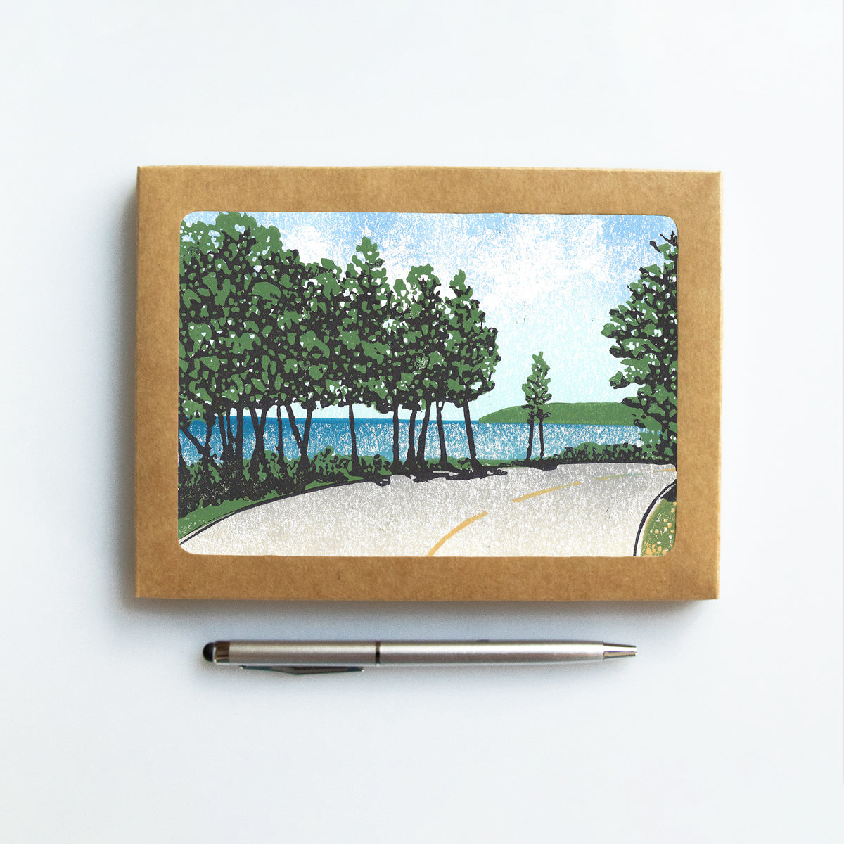 A casually elegant set of cards featuring Mackinac Island art by Natalia Wohletz titled Bend by the Bay.