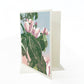 A casually elegant card featuring floral art by Natalia Wohletz titled En el Jardin.