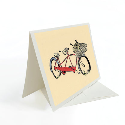 A casually elegant card featuring bicycle art by Natalia Wohletz titled Red Tandem.
