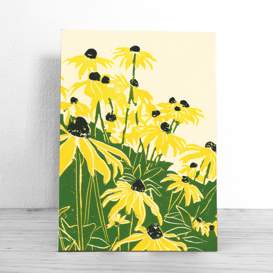 A high-quality, mounted giclée fine art print of a lino cut block print design by award-winning artist Natalia Wohletz, Peninsula Print, titled Black Eyed Susan's.