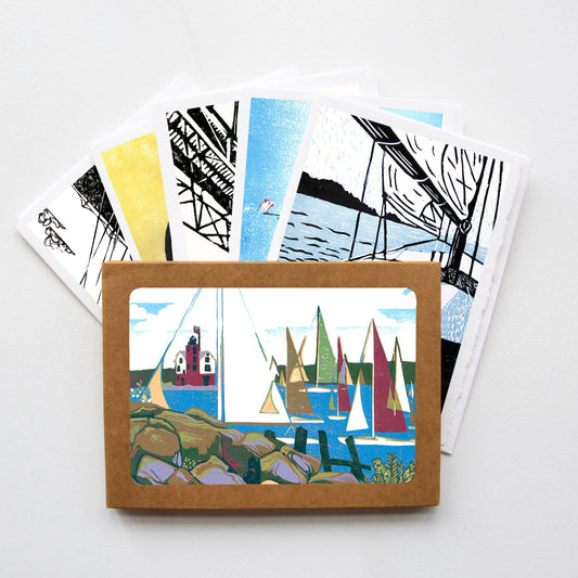 A casually elegant set of cards featuring sailing and Mackinac Bridge art by printmaker Natalia Wohletz of Peninsula Prints.