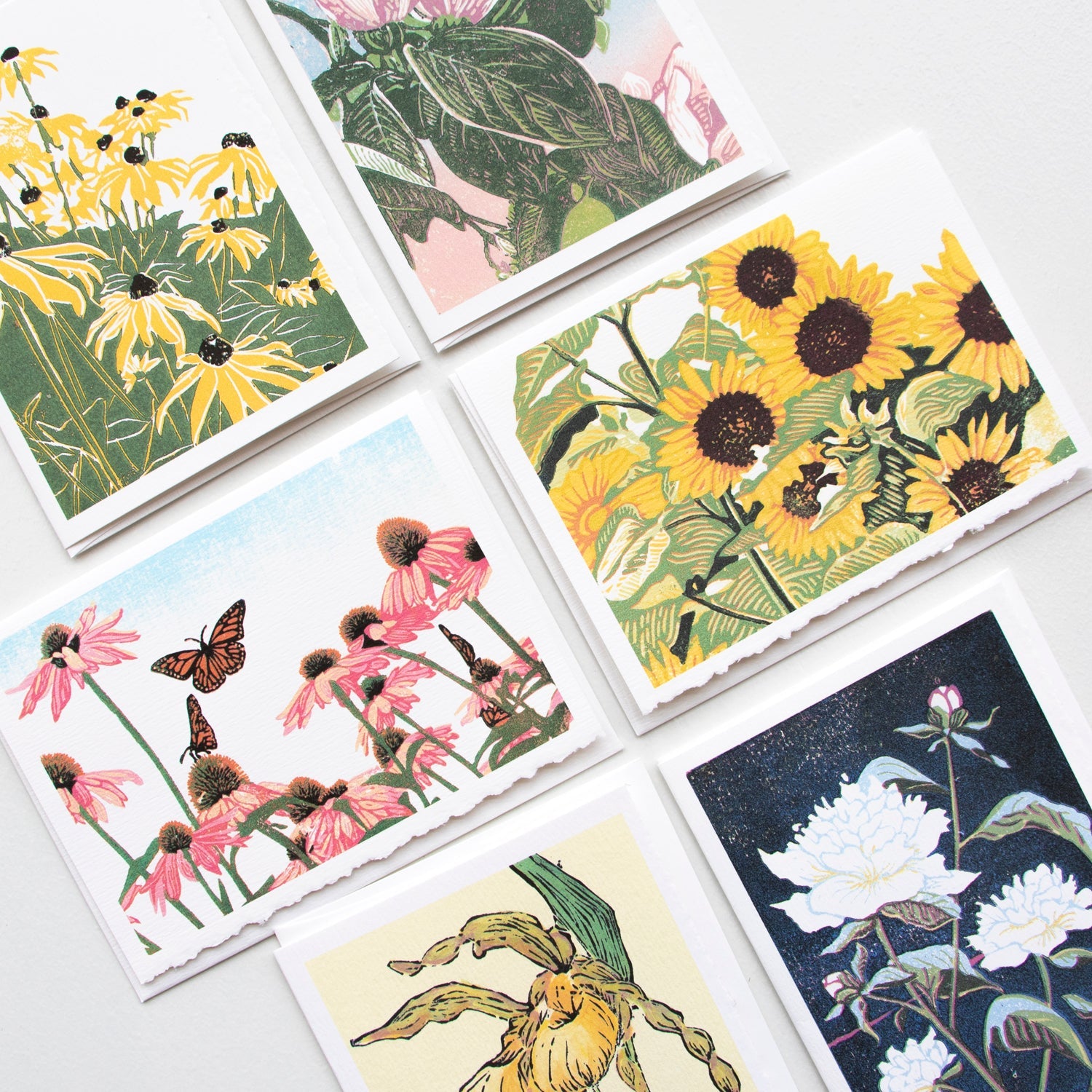 A casually elegant set of floral cards featuring flower art by printmaker Natalia Wohletz of Peninsula Prints.