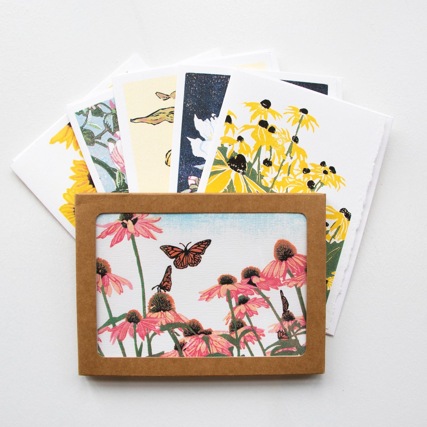 A casually elegant set of floral cards featuring flower art by printmaker Natalia Wohletz of Peninsula Prints.