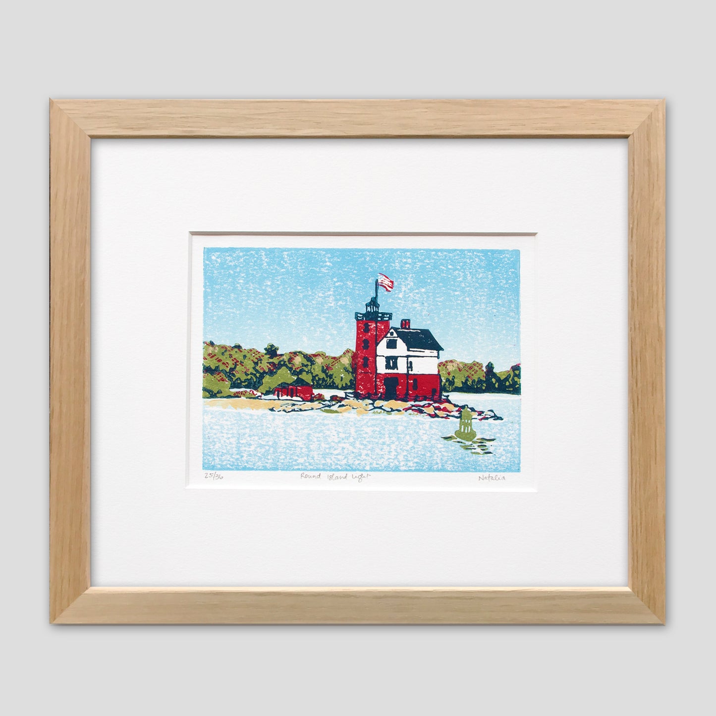 Framed nautical art created by Natalia Wohletz of Peninsula Prints, Mackinac Island. Round Island Light is a four-color linoleum block print of one of Michigan's most beloved lighthouses. 