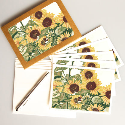 A casually elegant card set featuring flower art by Natalia Wohletz of Peninsula Prints titled Sunflower Patch.